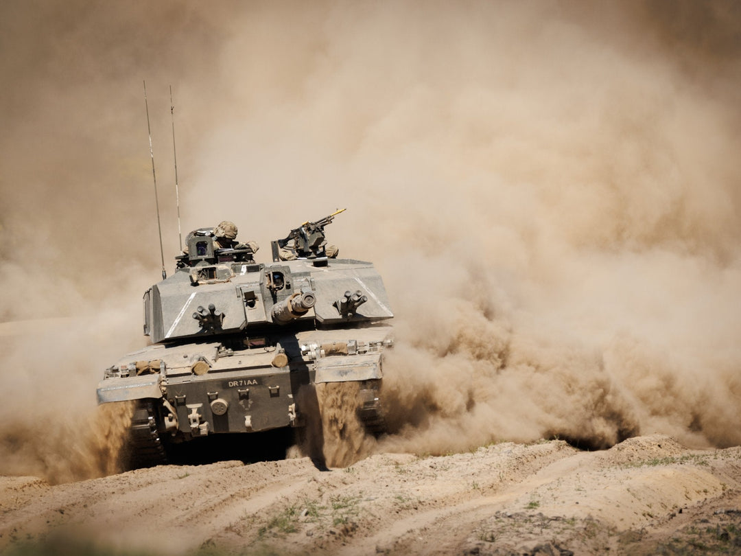 A Challenger 2 of the Royal Tank Regiment advances through dust during Exercise Steadfast Defender, Poland, May 2024