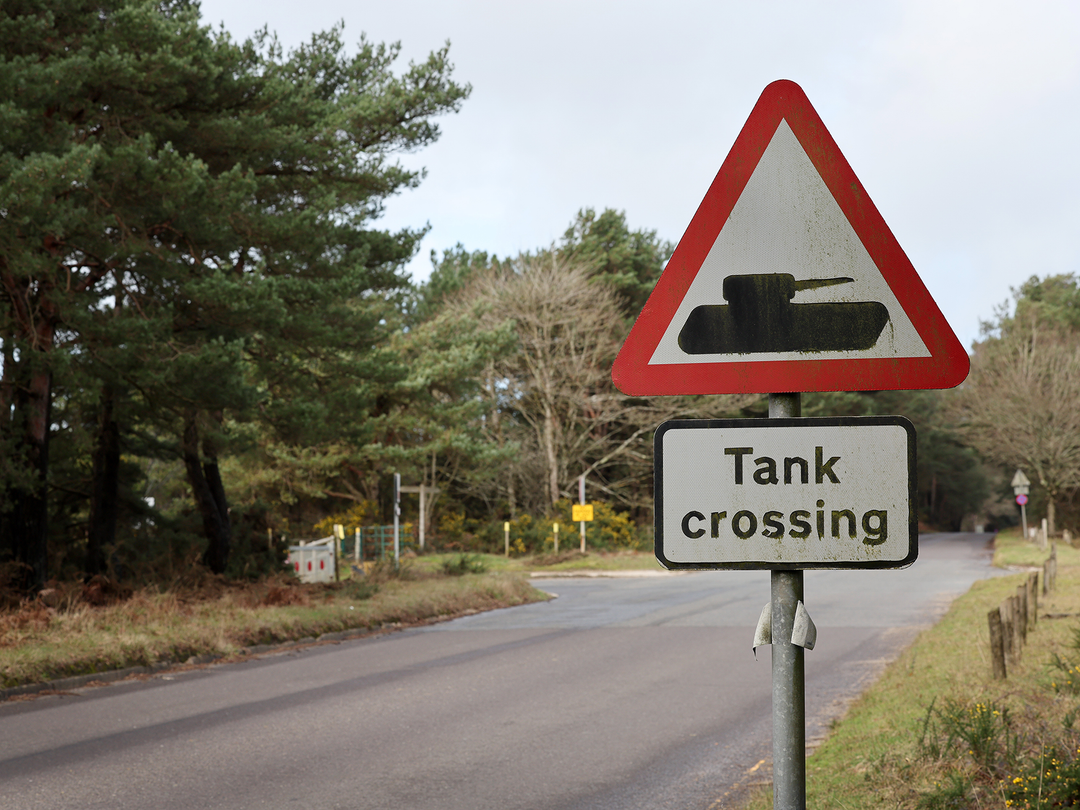 a tank crossing sign