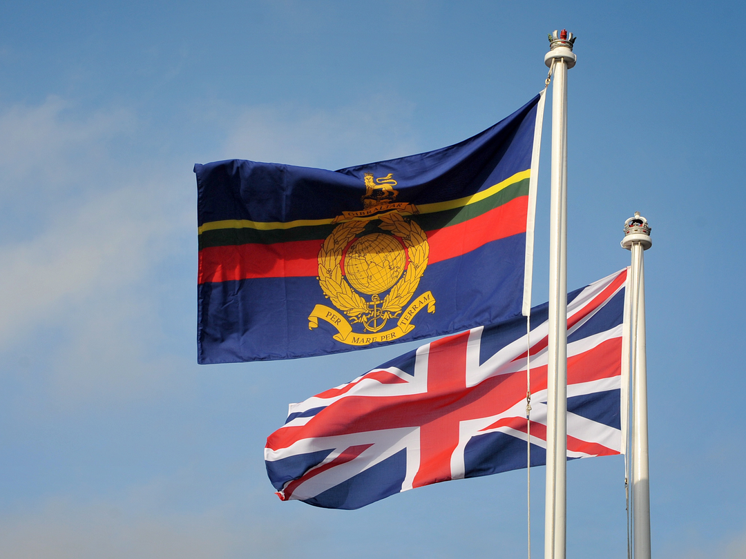 Royal Marines flag next to a Union Jack photo