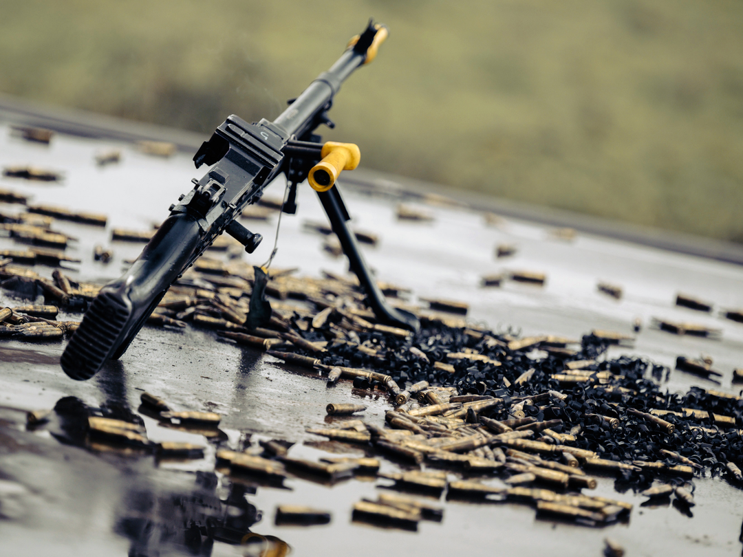 General Purpose Machine Gun surrounded by spent cartridges Photo Print - British Army Posters, Prints, & Visual Artwork Hampshire Prints 6 x 4 No Frame No