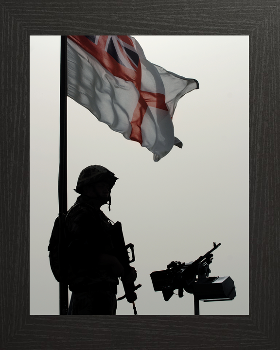 Royal Navy Sentry and White Ensign Umm Qasr Iraq April 2008