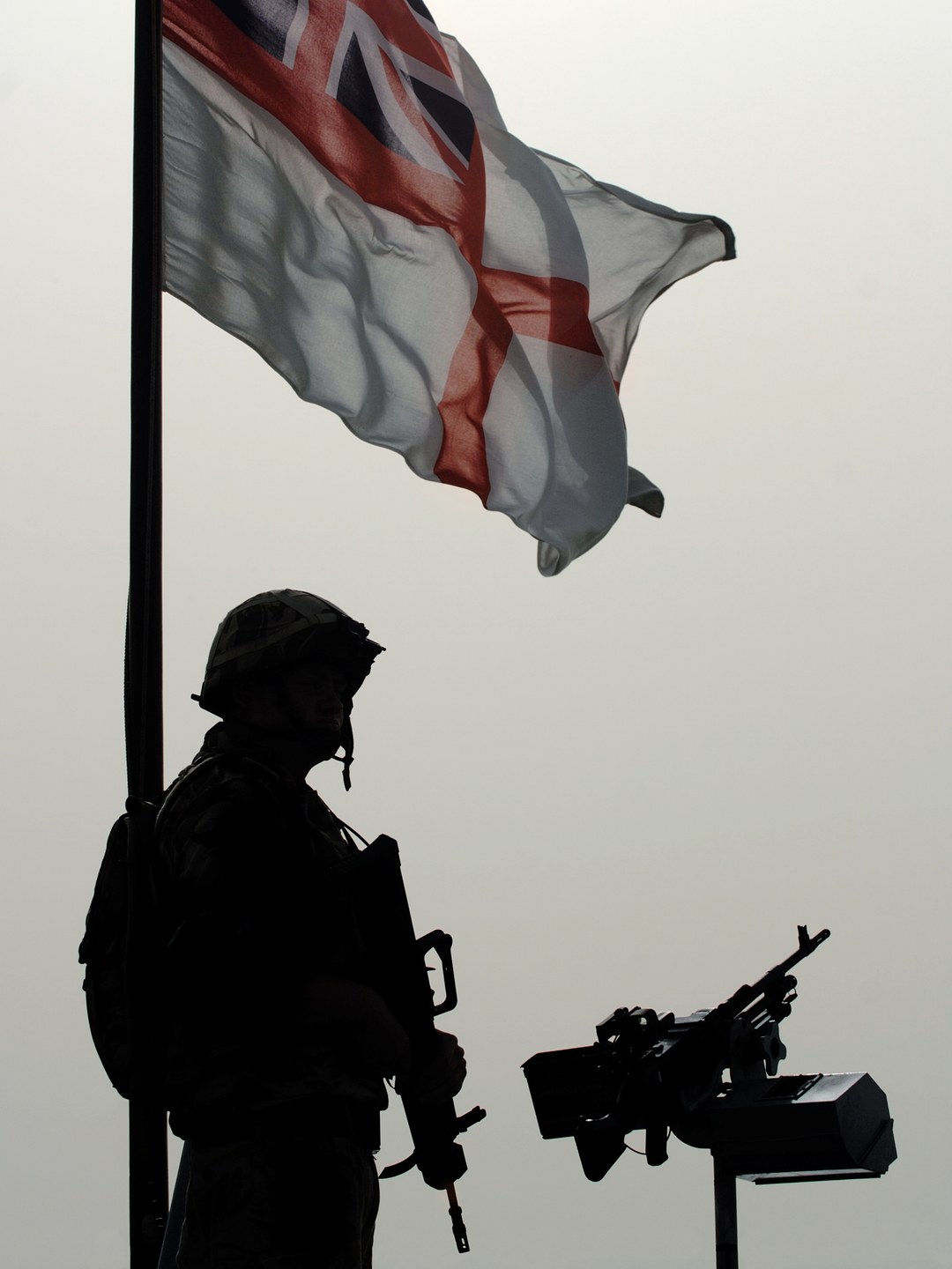 Royal Navy Sentry and White Ensign Umm Qasr Iraq April 2008