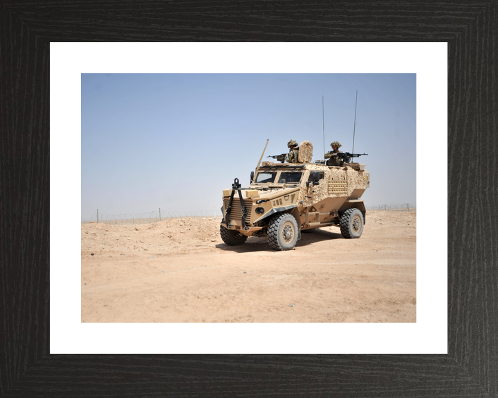 British Army Foxhound Two Roof Gunners Bastion June 2012