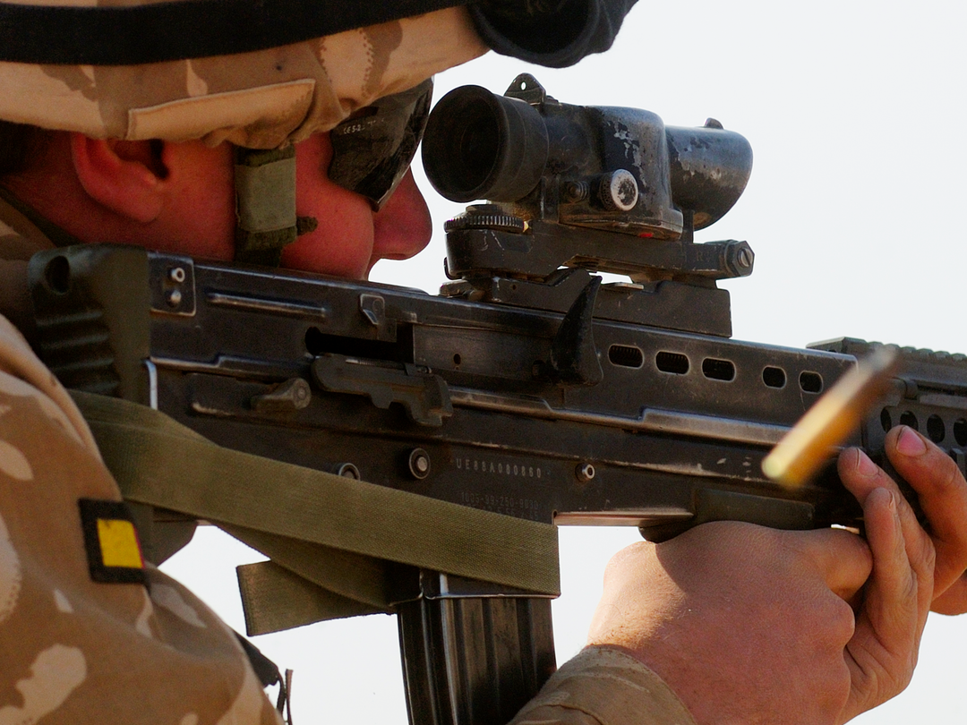 British Army Soldier Fires SA80 Camp Bastion 2009